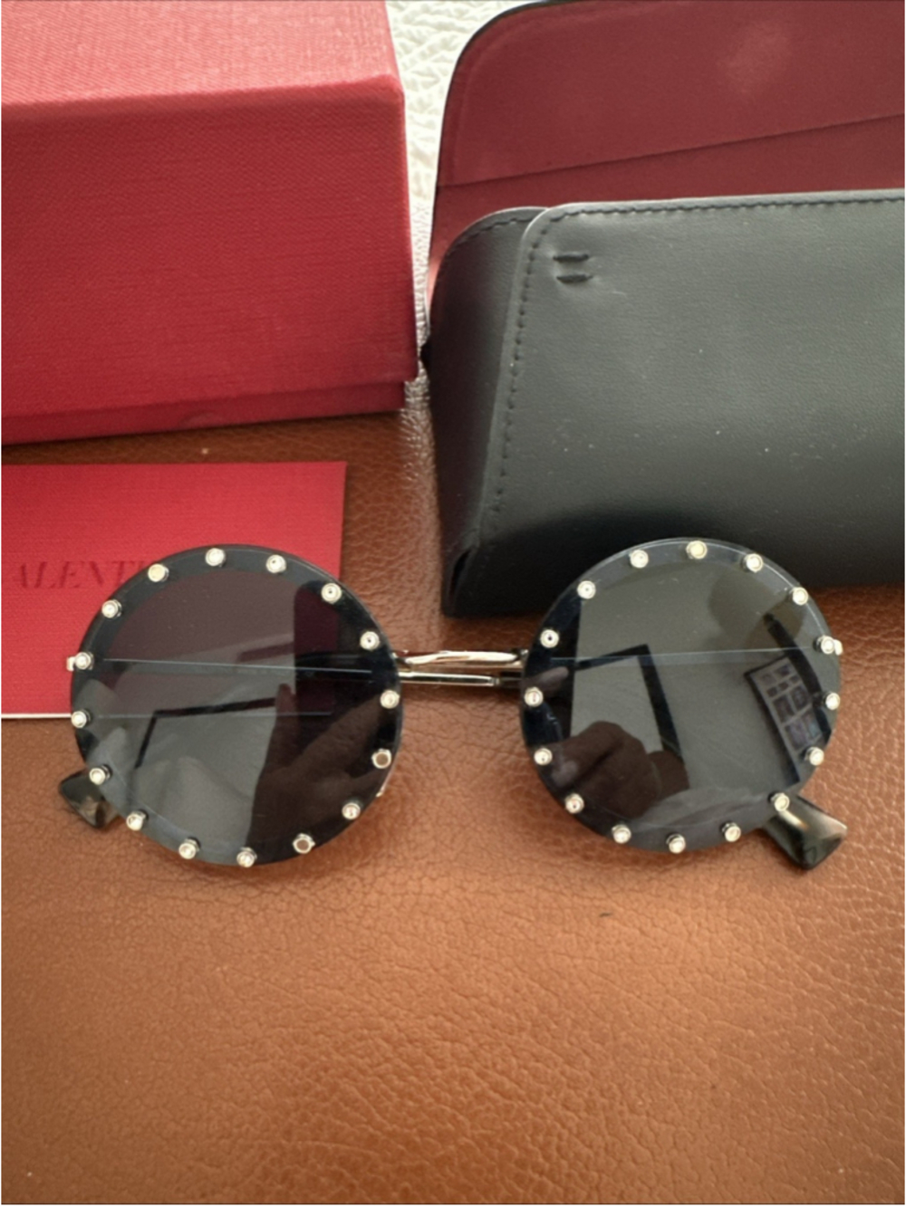 Valentino Black Round Sunglasses With Gold Tone Bridge And Crystal Studs